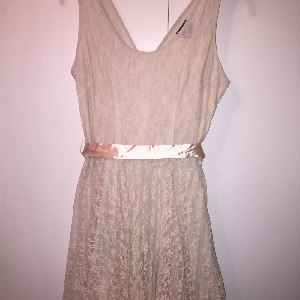 Cream colored v neckline tea dress